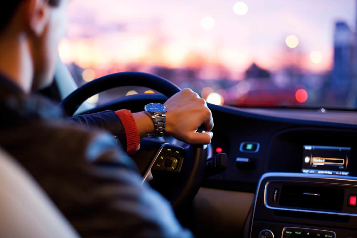 Driver operating a vehicle illustrating legal cannabis transportation considerations under Ohio possession laws