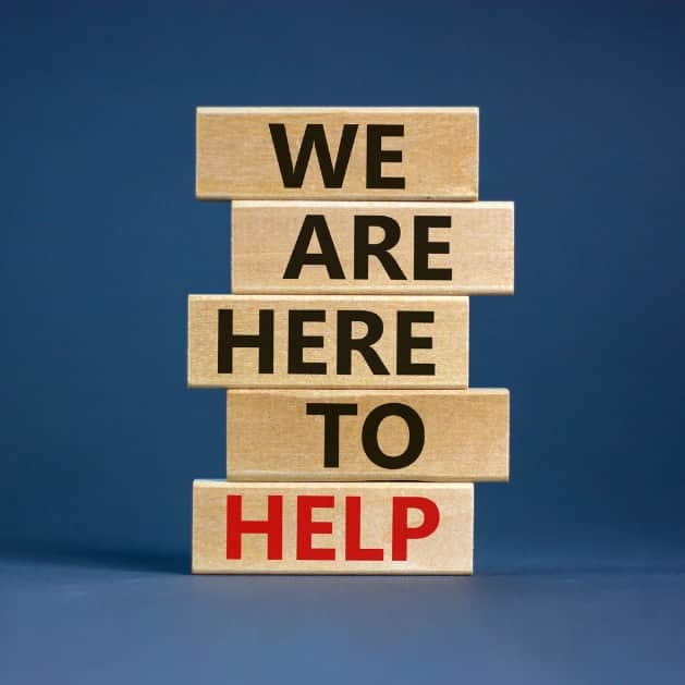 blocks displaying we are here to help for customers visiting a dispensary for the first time