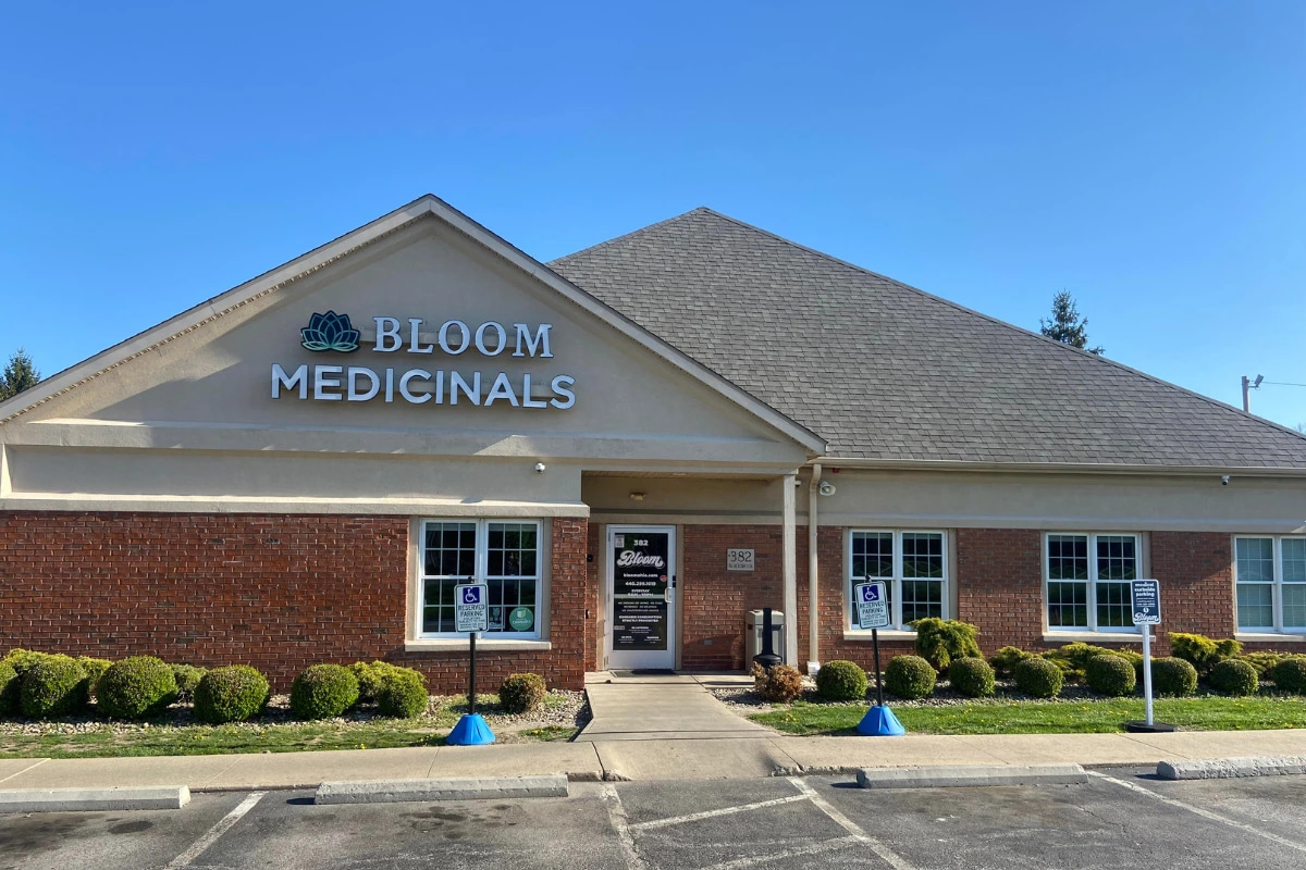 Bloom Painesville Township dispensary exterior with Bloom Medicinals signage and brick façade.